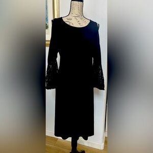 R & M Richard’s from Macys black cocktail dress, knee length.